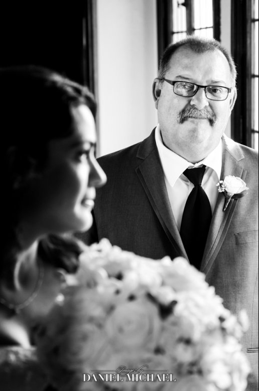 Natural Candid Wedding Photography of Heartfelt scene of dad admiring the bride